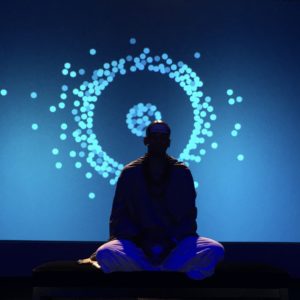 Dandapani focusing his awareness on his spine during Xerocon 2016 before he spoke.